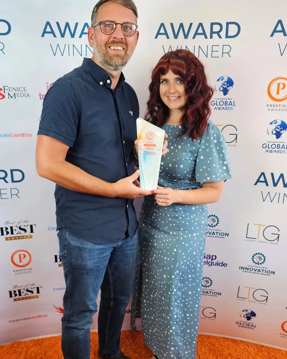 Mark and his wife collecting the Wales Prestige Awards 2026/27 trophy