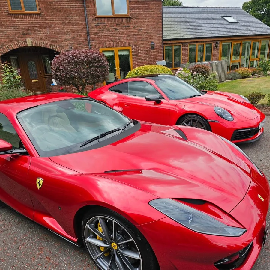 Ferrari and Maserati on the same driveway